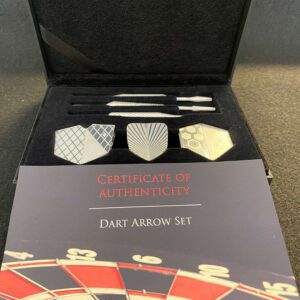 A box with darts in it and three different types of darts.