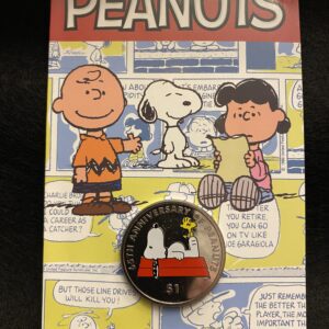 A peanuts coin is shown on top of the card.