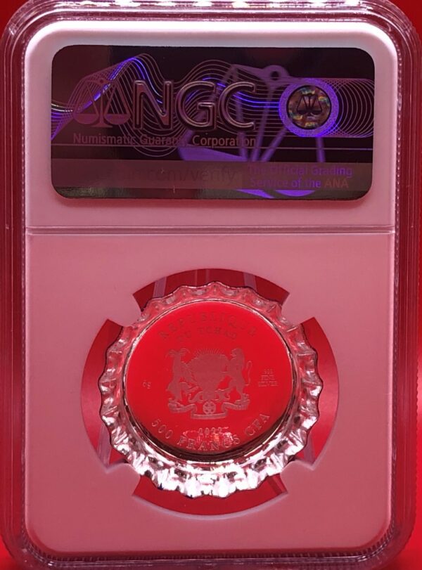 A red coin in a red PEPSI COLA LOGO SILVER VINTAGE BOTTLE CAP - PF 70 EARLY RELEASE NGC with a vintage bottle cap design.