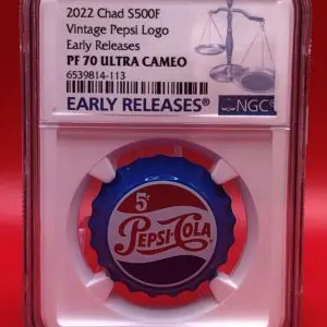 A PEPSI COLA LOGO SILVER VINTAGE BOTTLE CAP - PF 70 EARLY RELEASE with a prominent logo.