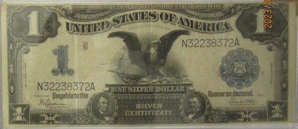 A silver certificate with an eagle and the words " united states of america ".