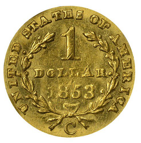 A gold coin with the united states of america on it.