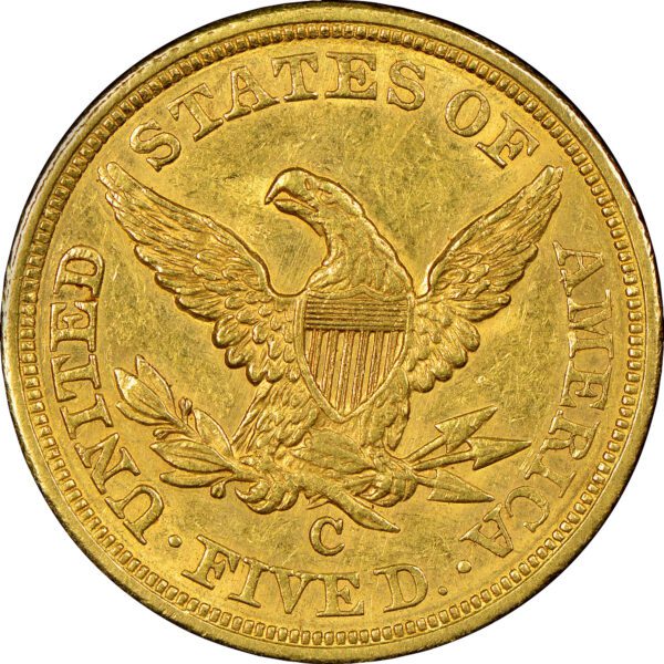 A gold coin with an eagle on it.