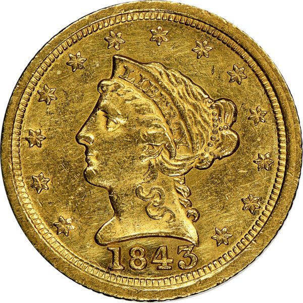 A gold coin with the face of an old woman.
