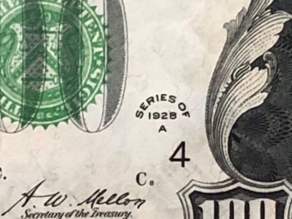 A close up of the back side of a dollar bill.