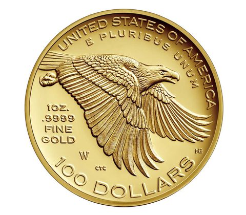 A gold coin with an eagle on it