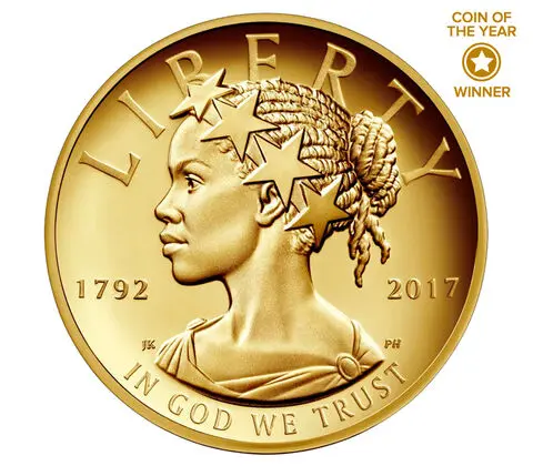 A gold coin with the face of an african american woman.