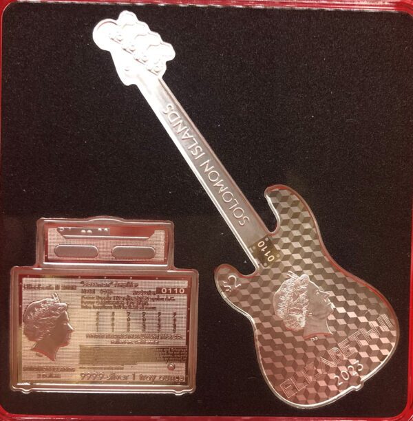 A silver guitar and a credit card in a DYNAMIC DUO - 2X Fine Silver Shaped Coin Set box.